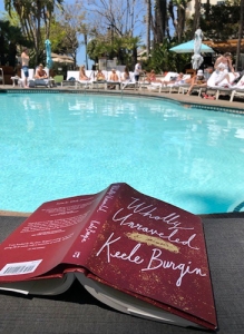 book Wholly Unraveled by a pool
