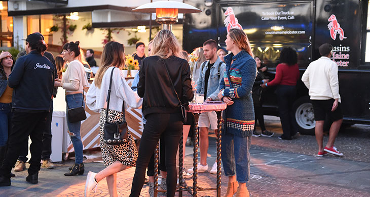 group standing at food truck