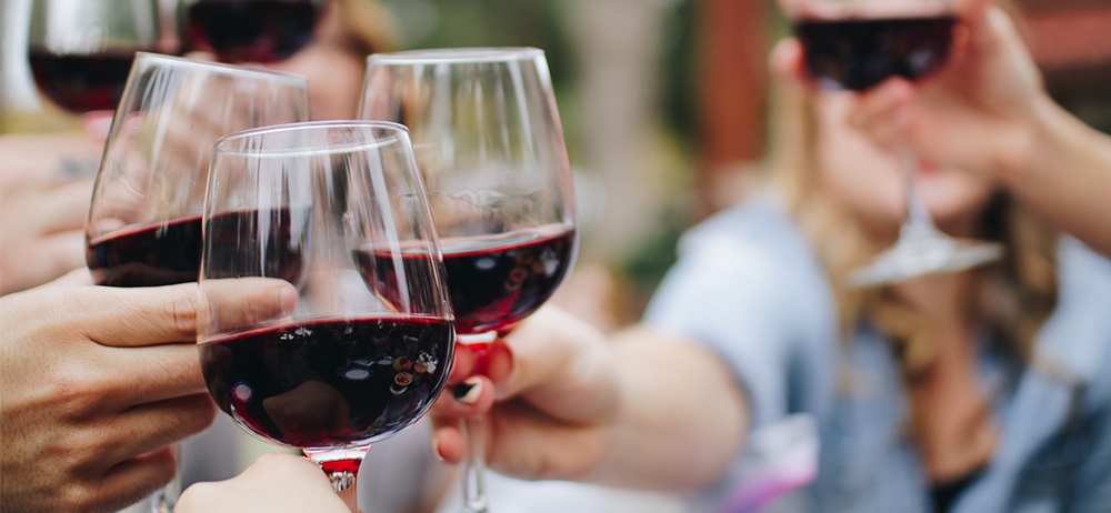 three glasses of red wine