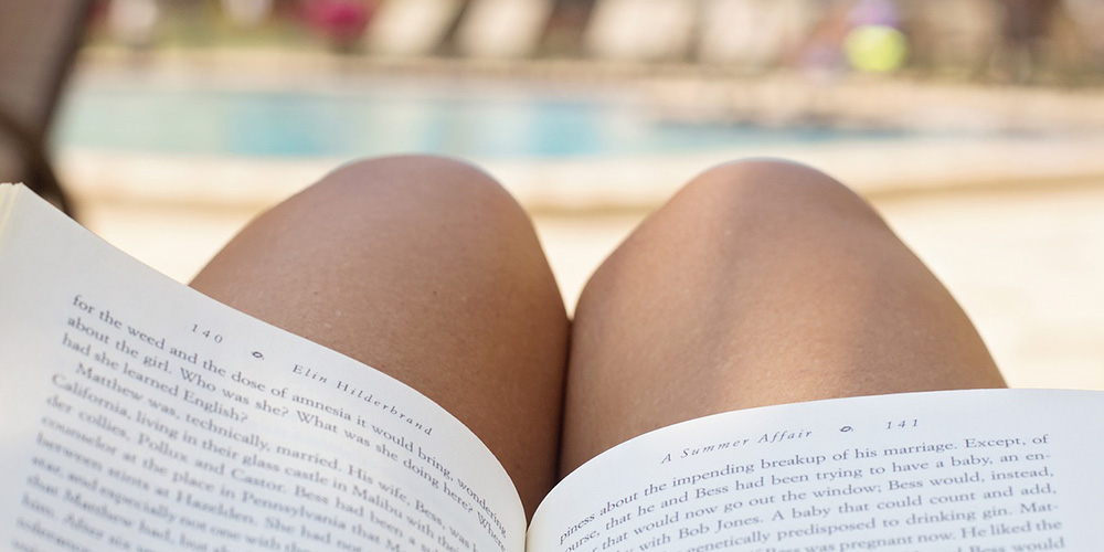 close up of a book on a person's lap