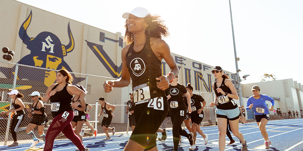 marathon runners wearing numbers