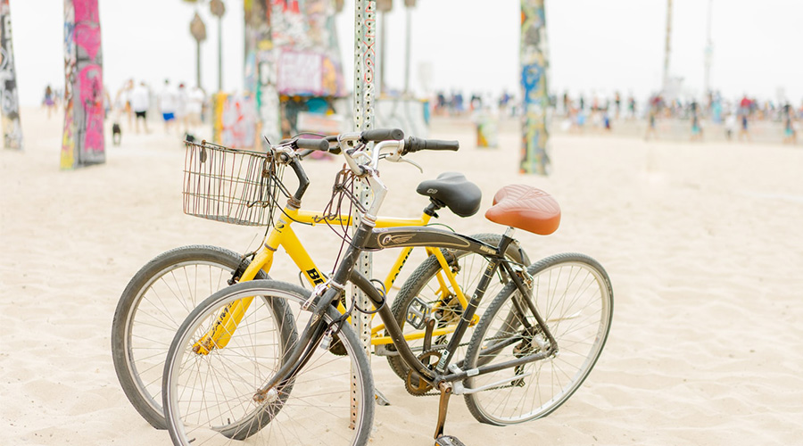 twi bicycles on the beach