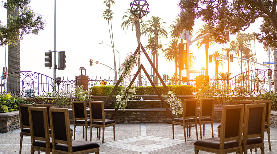 sunset over an outdoor seating area