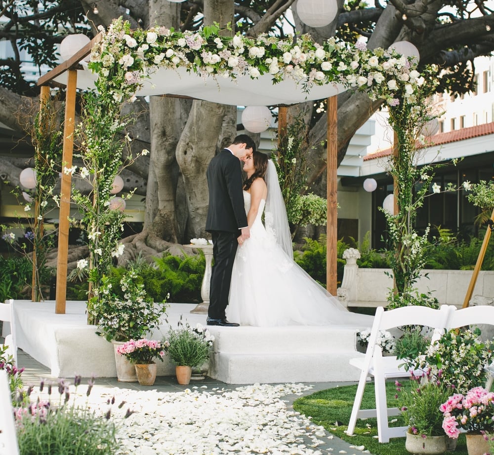 a wedding outside underneath the fig tree