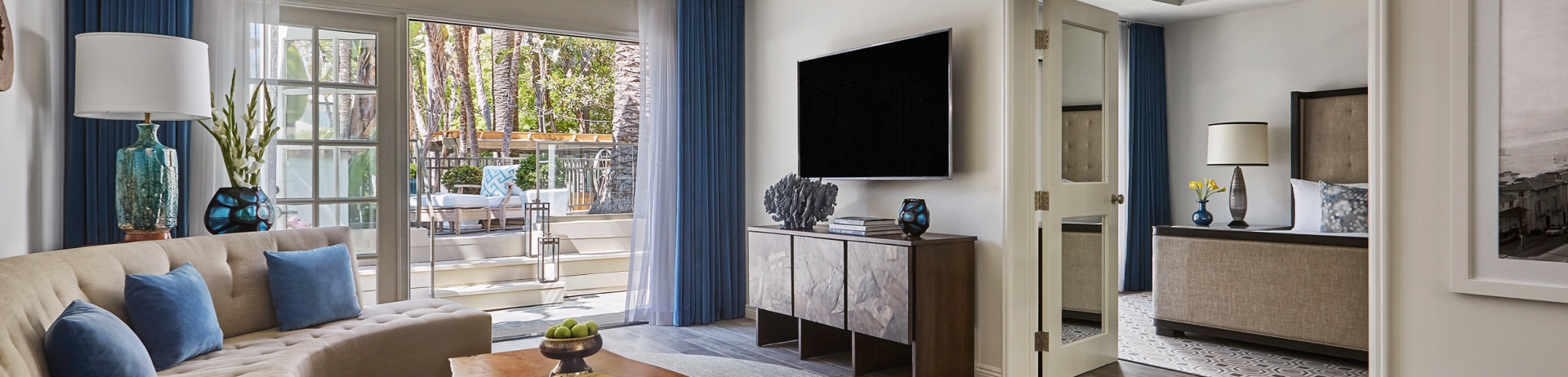 View of living area with coffee table and tv