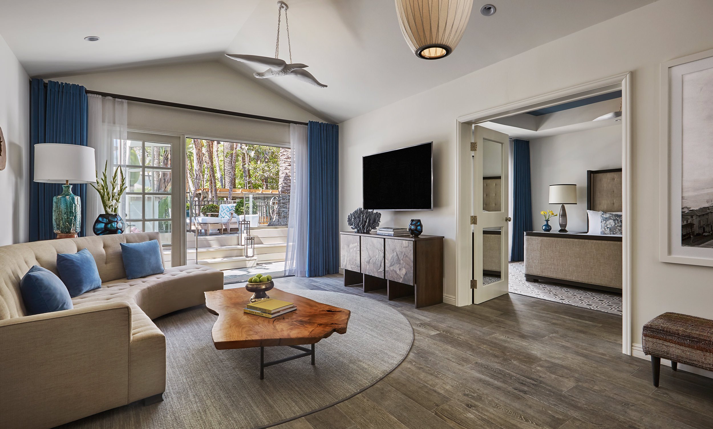 View of living area with coffee table and tv