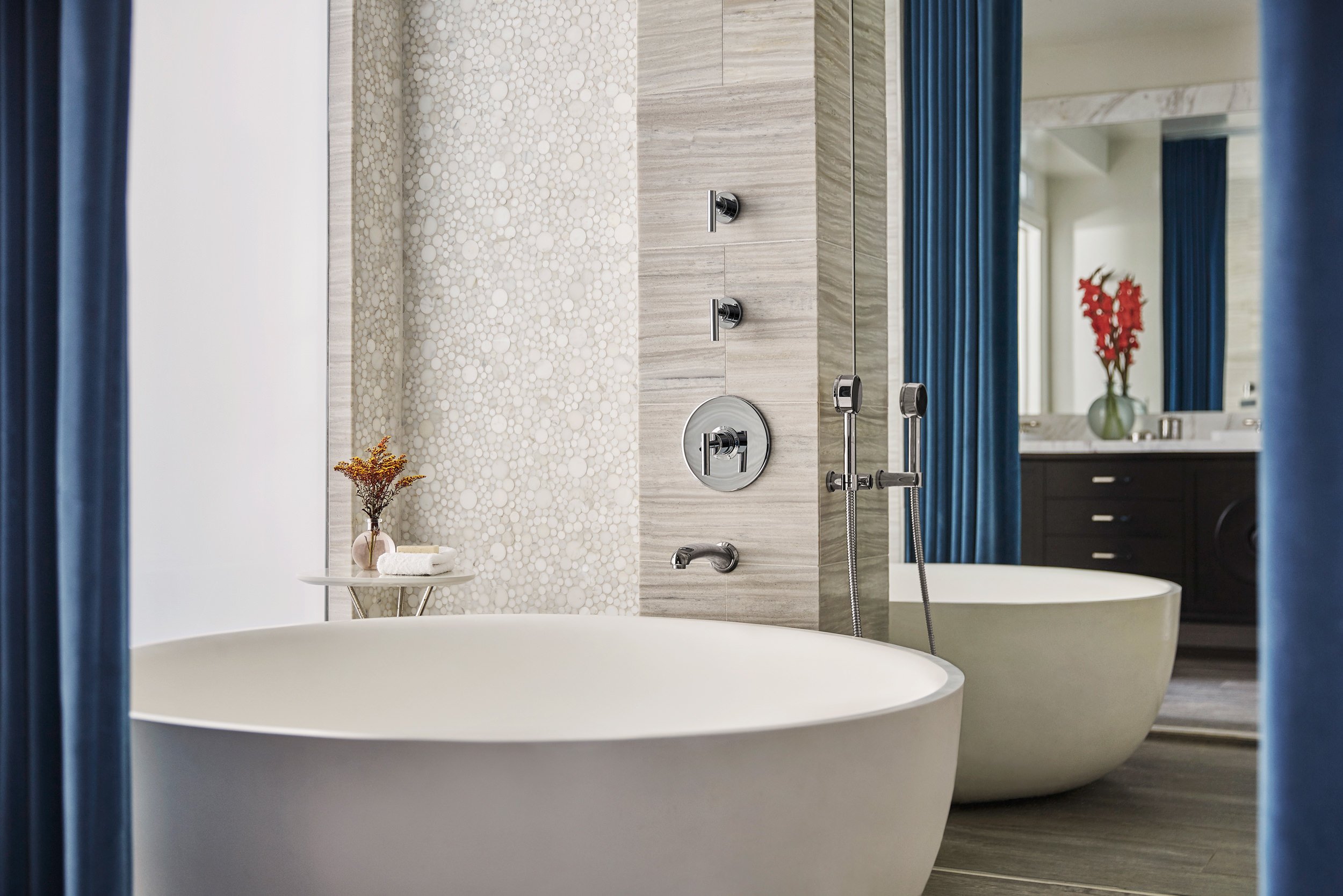 bathroom with luxurious bathtub