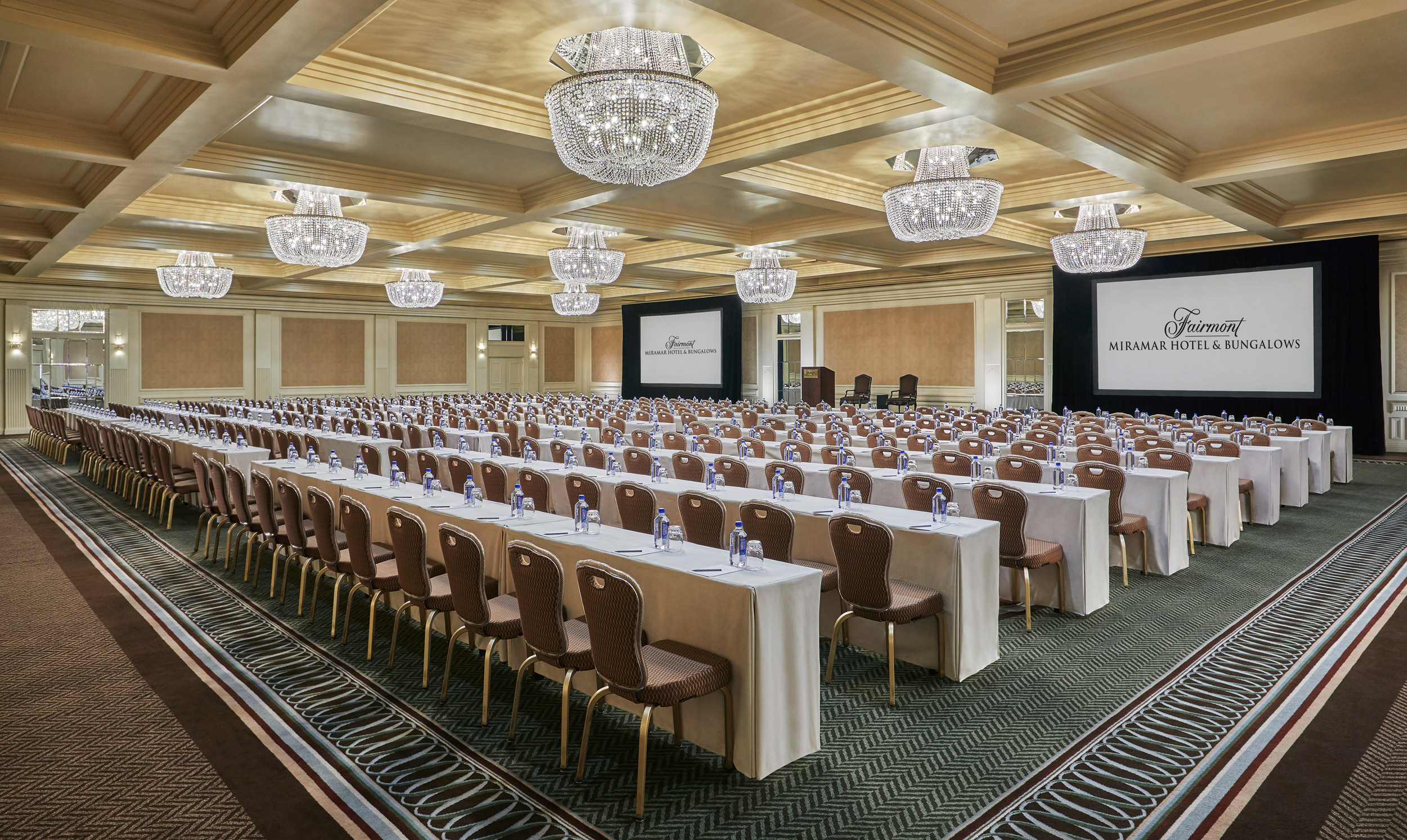 Ballroom with tables organized in rows.