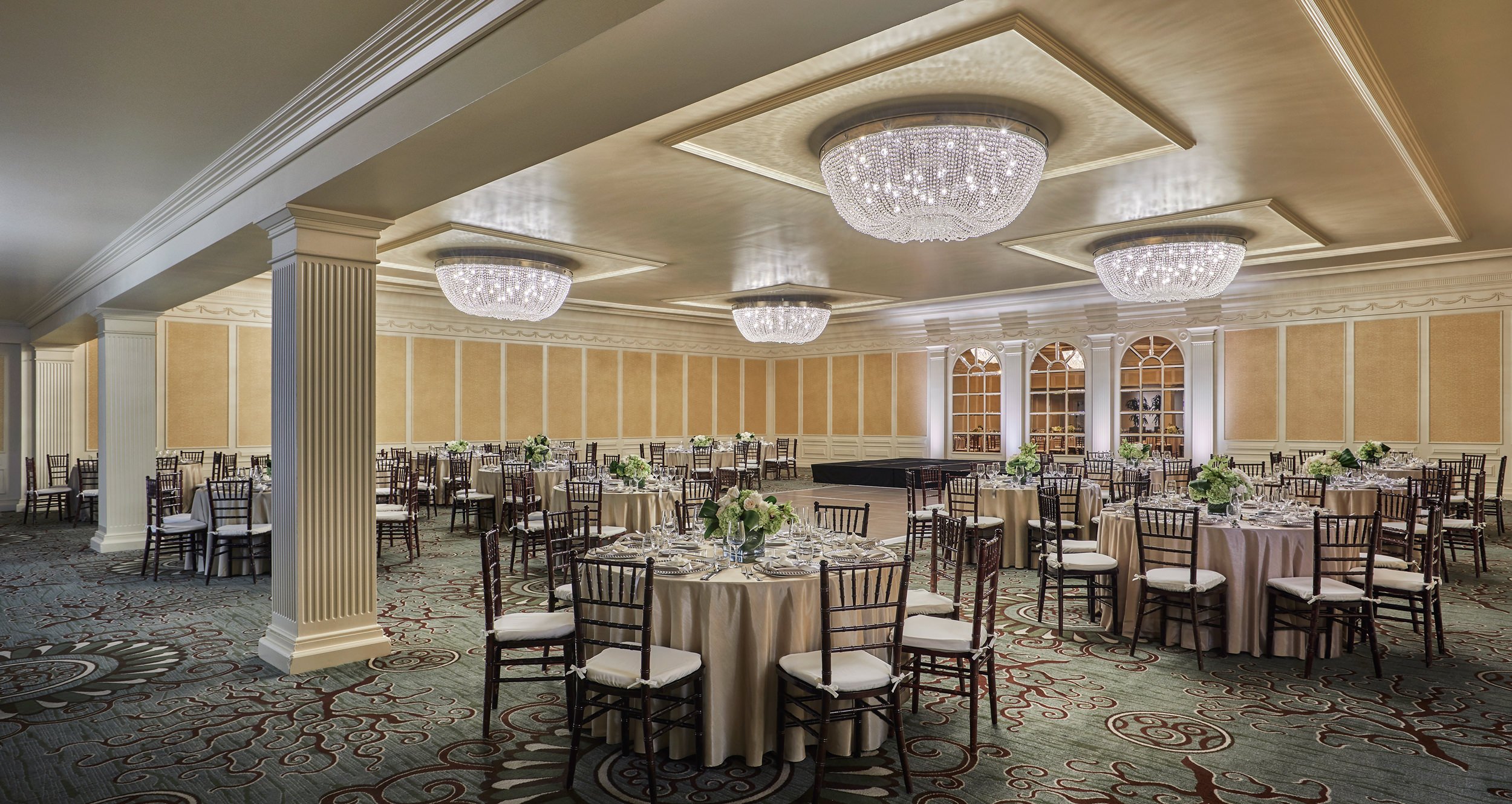 Ballroom with view of dome chandeliers