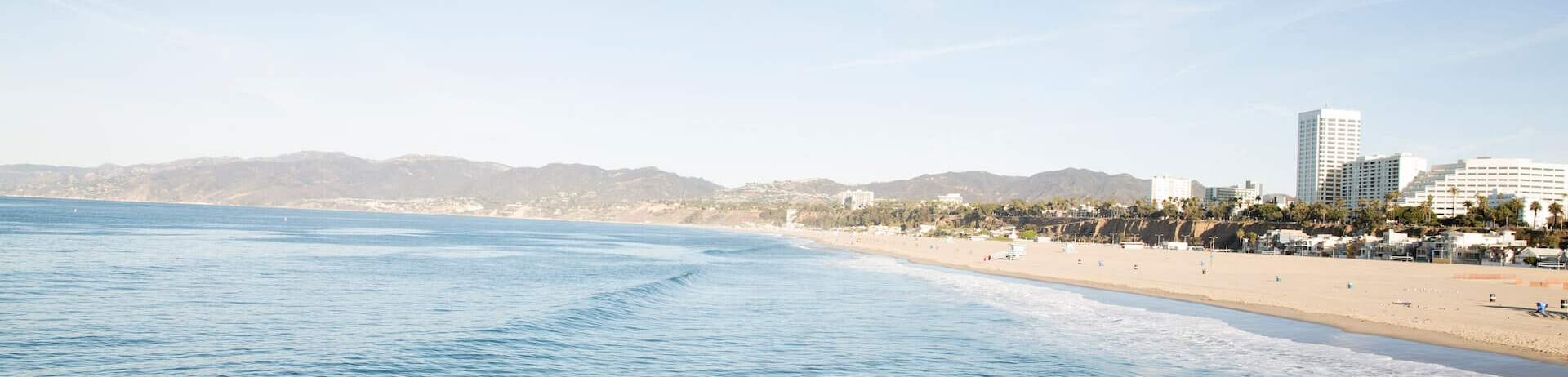 beach with city and mountain views