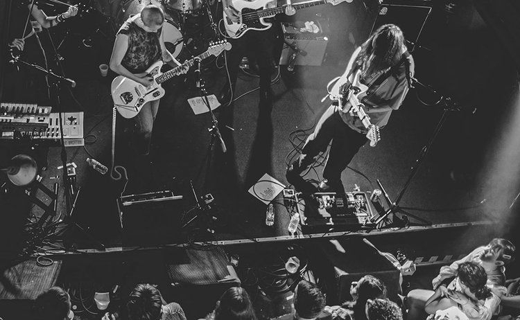 band planing on stage