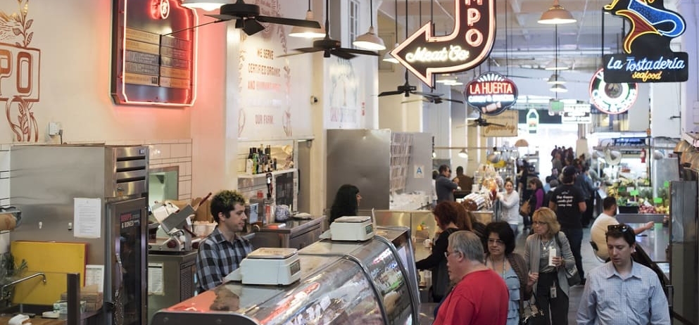 people shopping at market