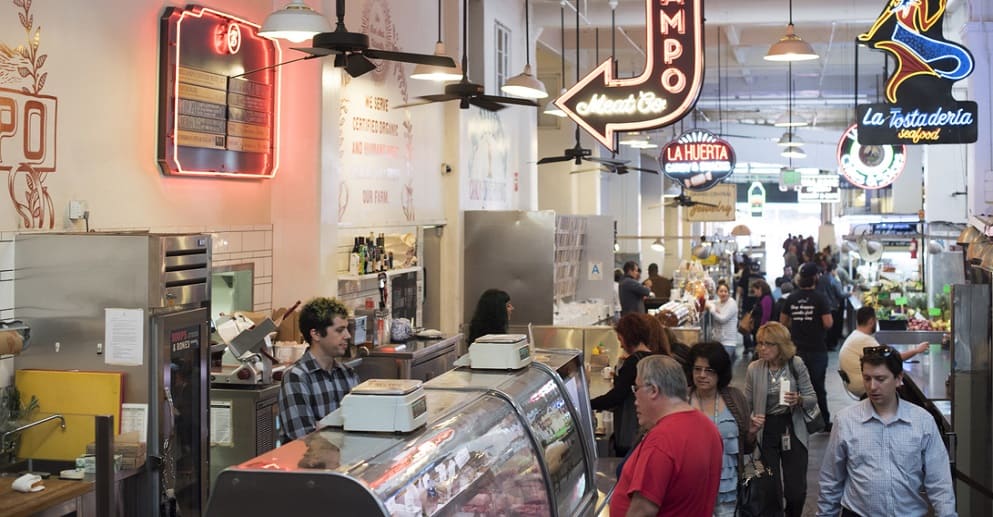 people shopping at market