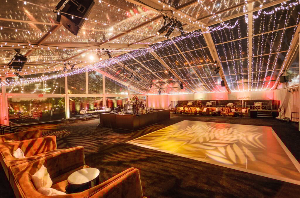 glass venue decorated for the holidays