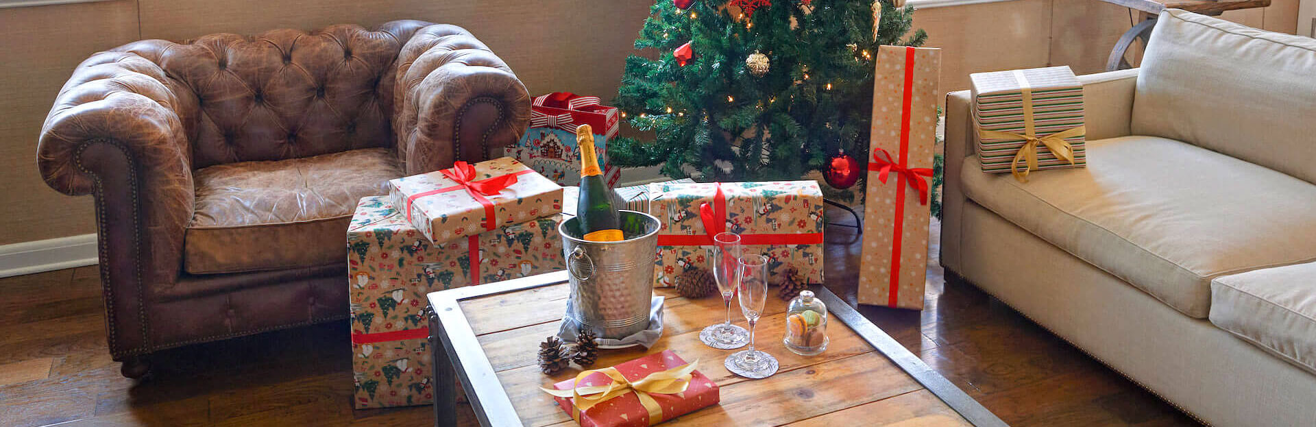Champagne and gifts on a coffee table
