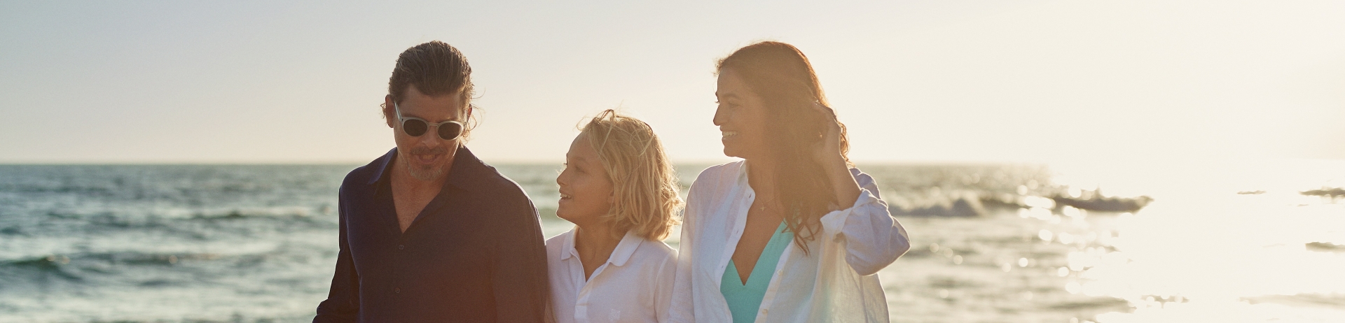 family walking on the beach in santa monica