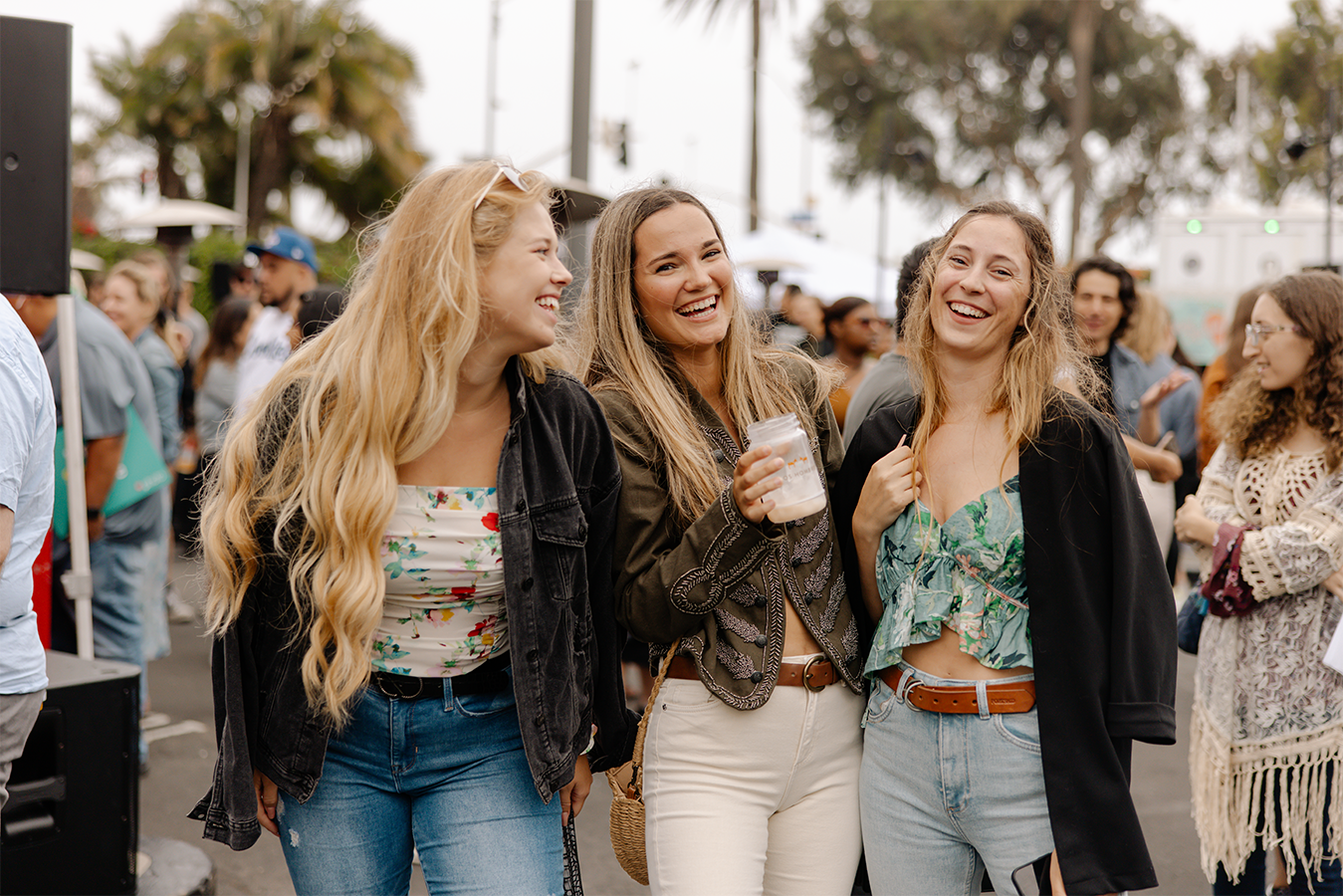 Friends hang out together at the Night Market at The Bungalow